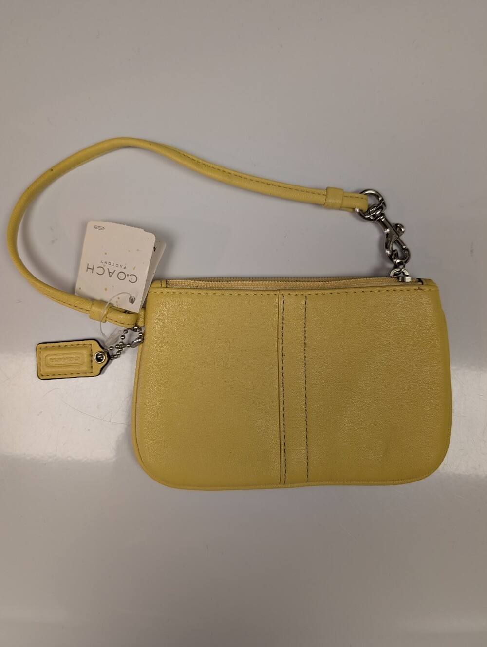 Coach yellow leather wristlet purse/wallet
